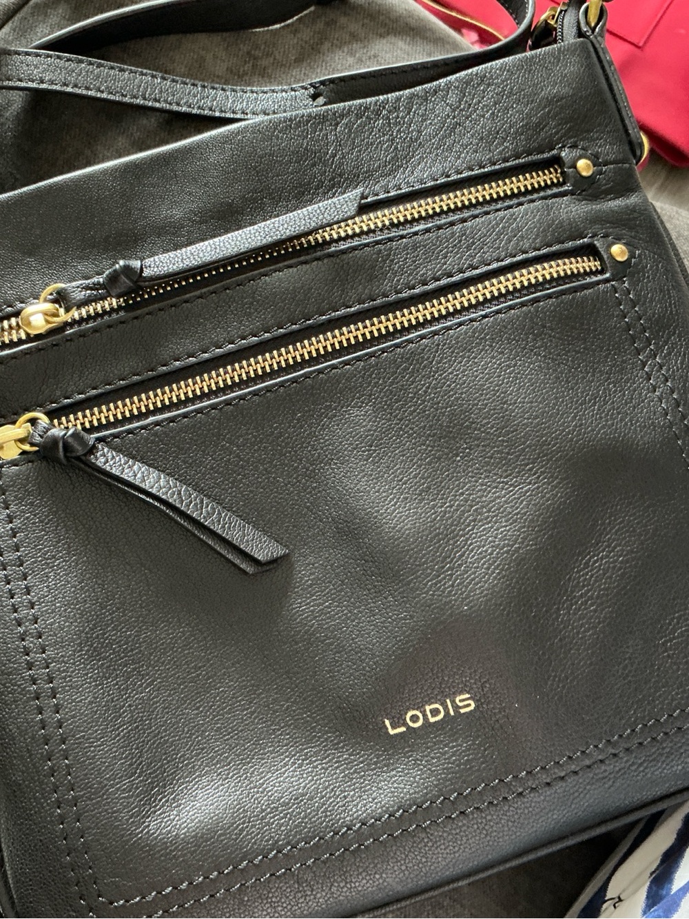 Lodis Black Leather Shoulder Bag with Gold Zippers